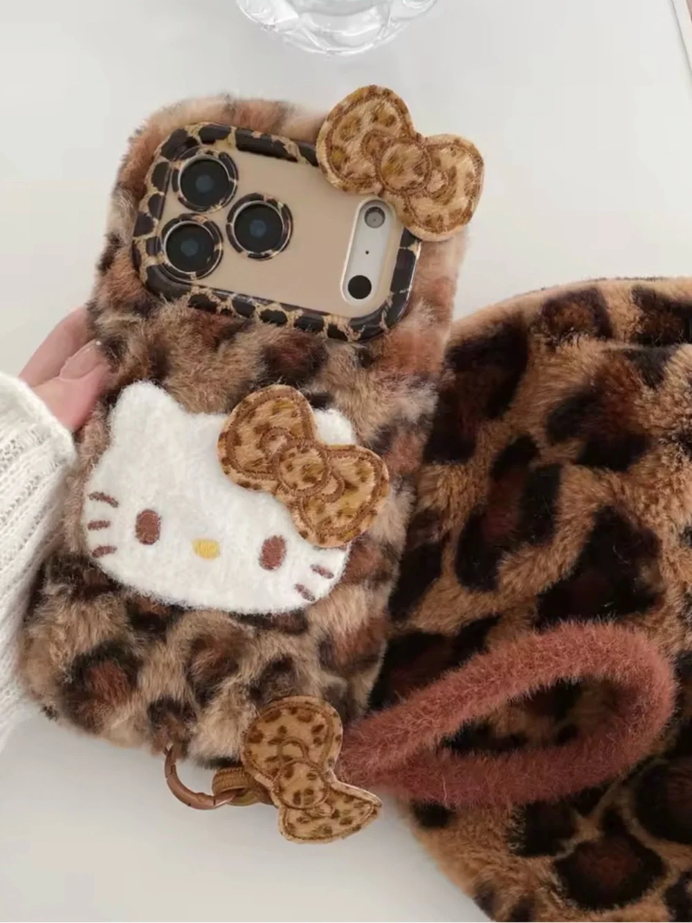 Hello Kitty Leopard Fur Phone Case with Bow Accents - Brown Iphone 17 Pro Max